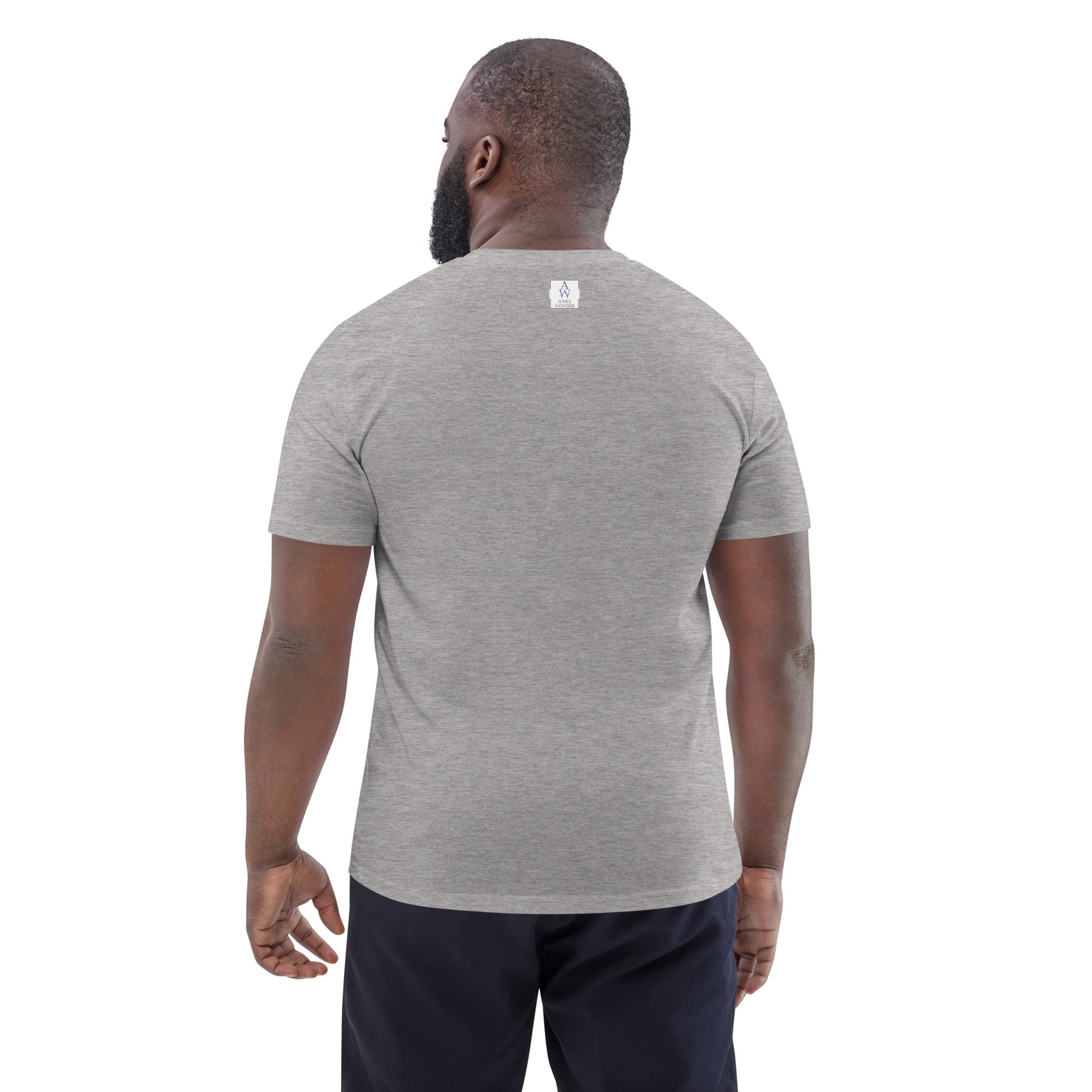 Back view of man wearing organic cotton heather grey t-shirt showing minimal Anke Wonder branding and clean design.