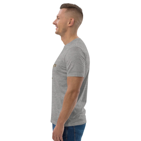 Side View of man wearing a gray t-shirt with a bee design on a white background.
