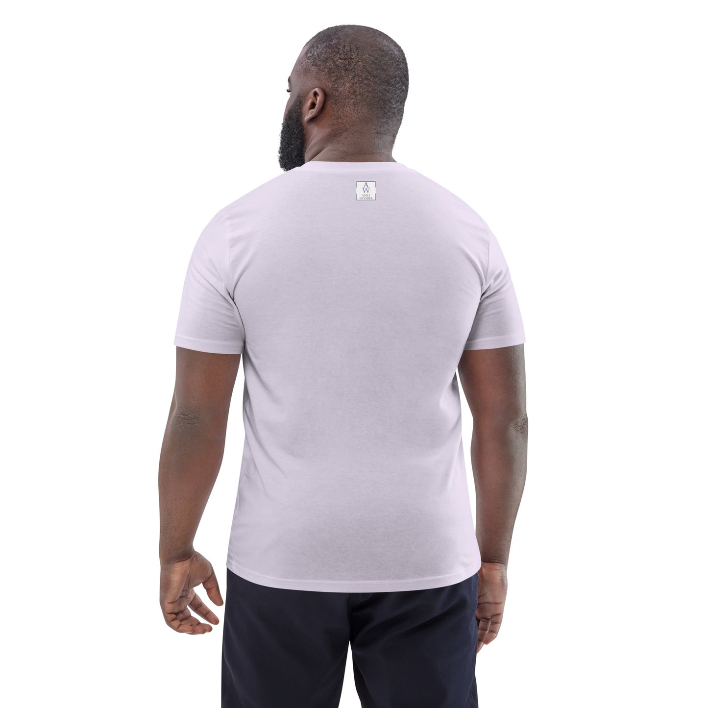 Back view of a man wearing an organic cotton lavender t-shirt; clean and simple with the Anke Wonder label, highlighting the eco-conscious fit and fabric.