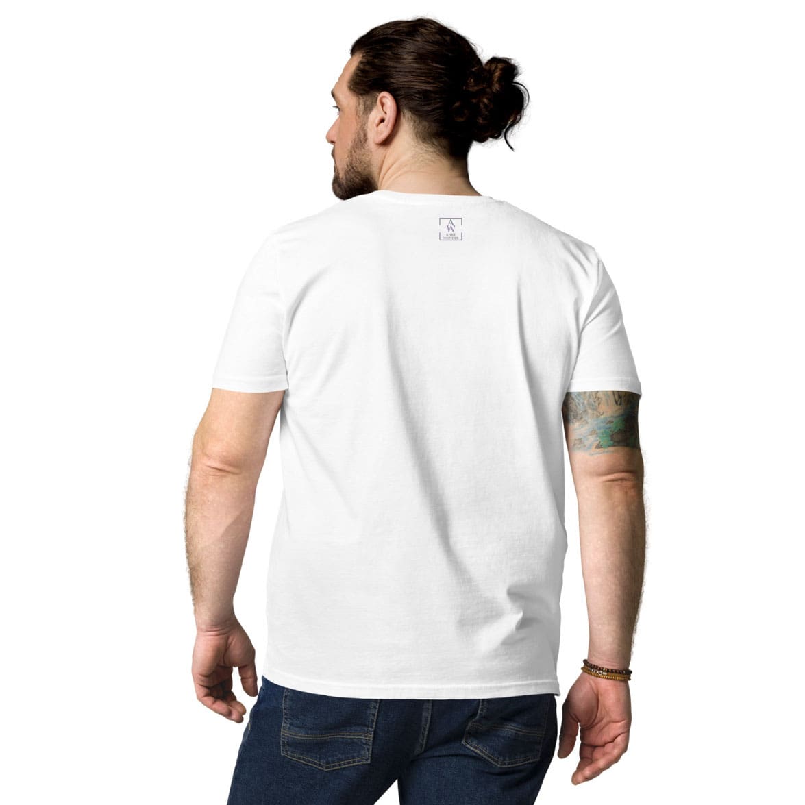 Back view of man wearing white organic cotton t-shirt, showing minimalistic Anke Wonder branding near the collar.