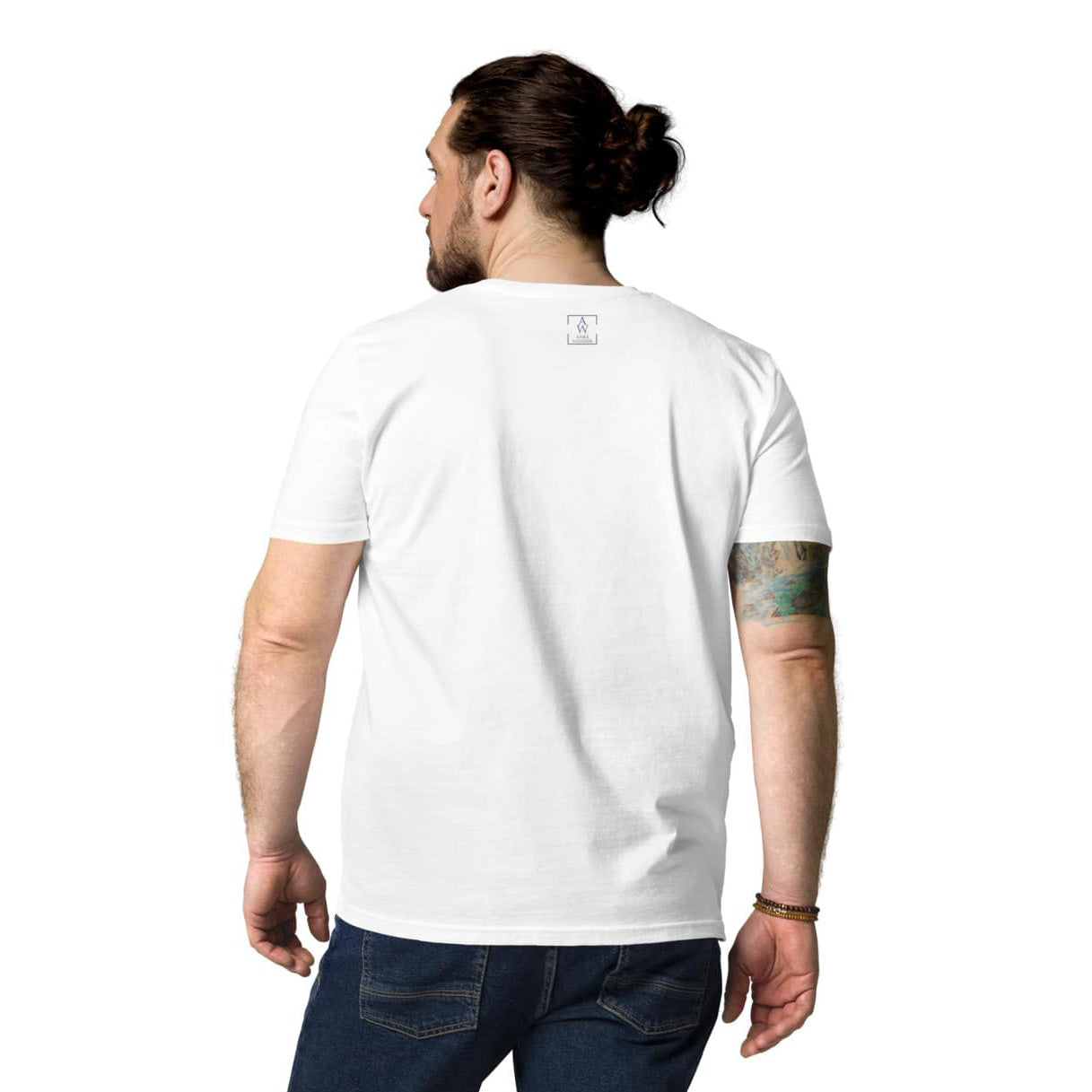Back view of man wearing plain white organic cotton t-shirt showing clean and minimal back with the Anke Wonder logo.