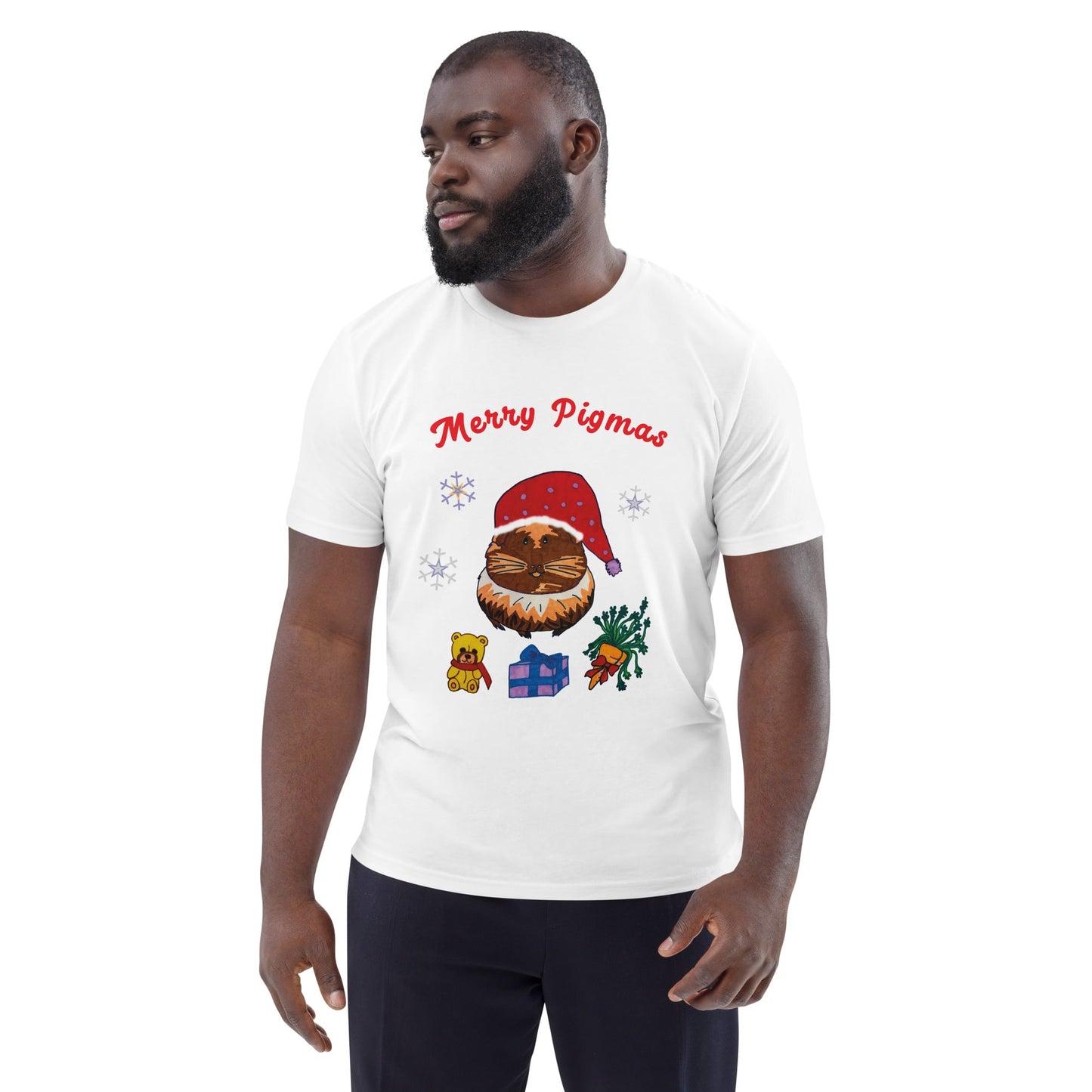 Man wearing a white Christmas Guinea Pig t-shirt with 'Merry Pigmas' design on a white background