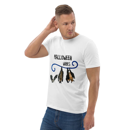 Man wearing a white t-shirt with 'Halloween Vibes' and bat illustrations on a white background