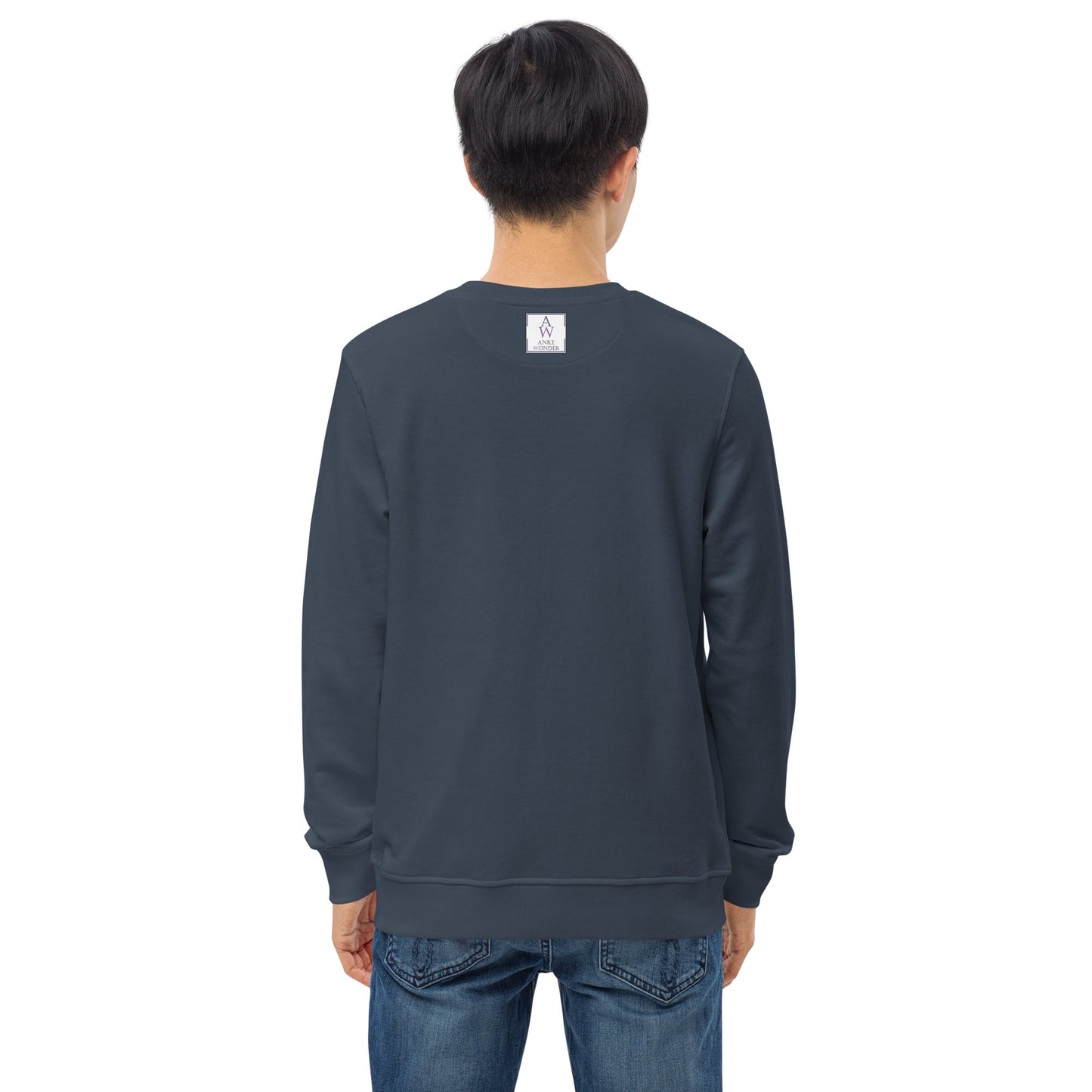 The back of the navy sweatshirt, highlighting the minimalist style and the Anke Wonder label near the neckline.