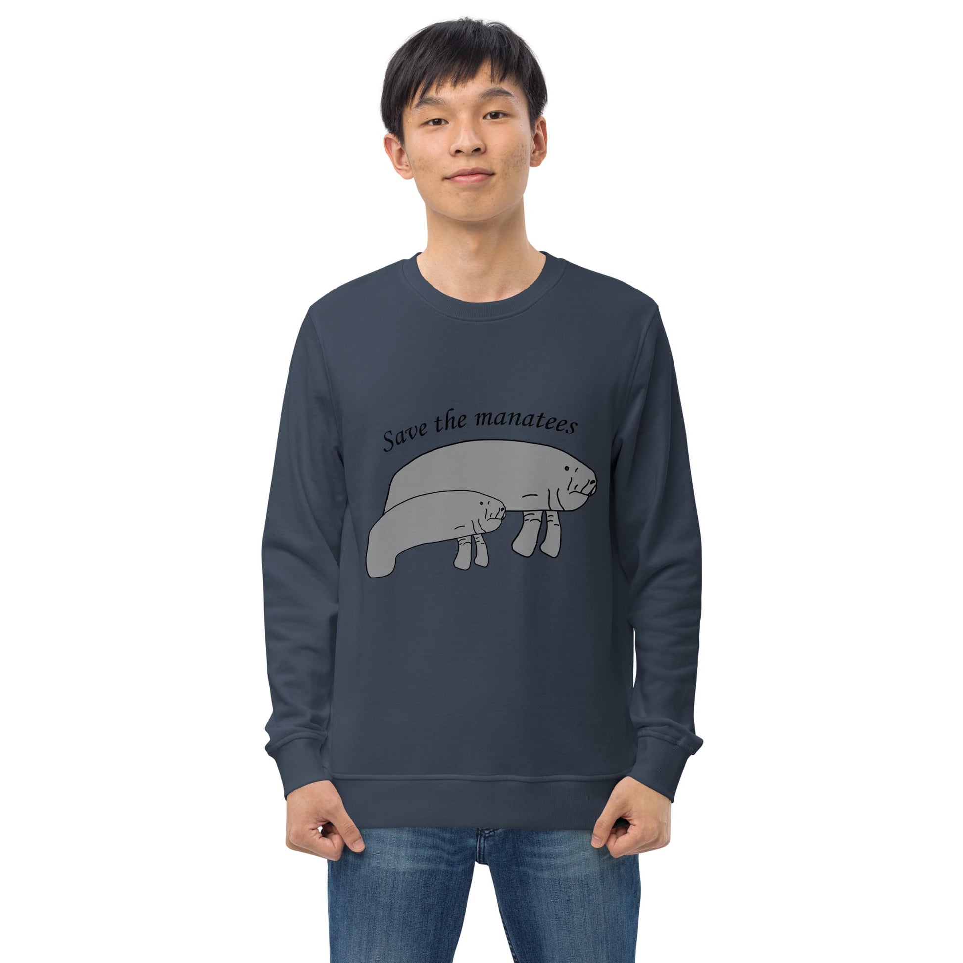 A model wears a navy 'Save the Manatees' sweatshirt, with the manatee design standing out against the deep color.