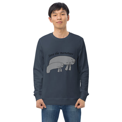 A model wears a navy 'Save the Manatees' sweatshirt, with the manatee design standing out against the deep color.