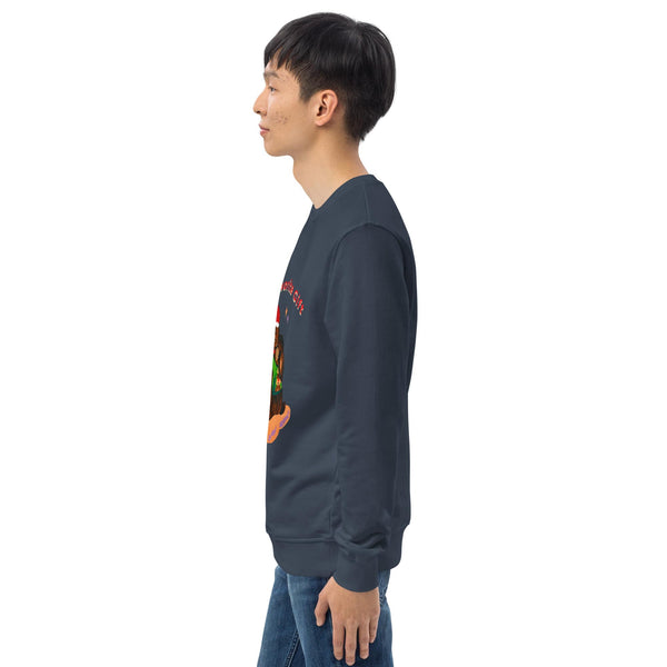 Man wearing a dark blue sweatshirt with colorful christmas graphics on the front, standing against a white background