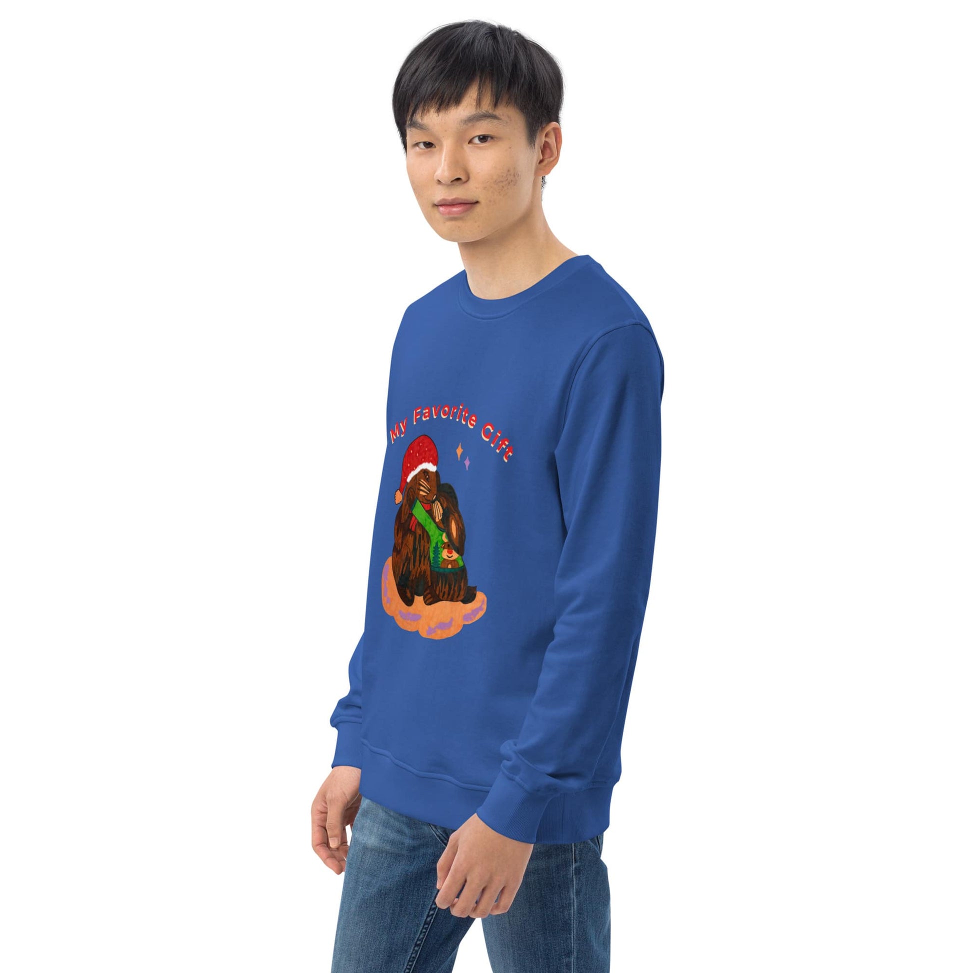 Man wearing a blue sweatshirt with a christmas graphic design on a white background