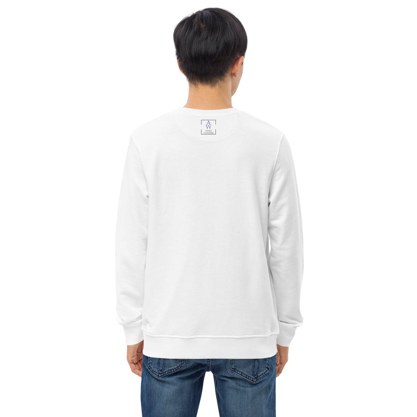 The back of the white sweatshirt, showing the clean design with the Anke Wonder label near the neckline.