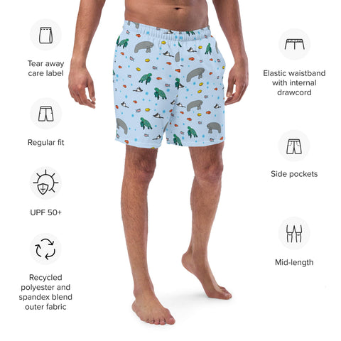 Close-up of men’s blue swim trunks with manatee and turtle print with product details of recycled polyester fabric.