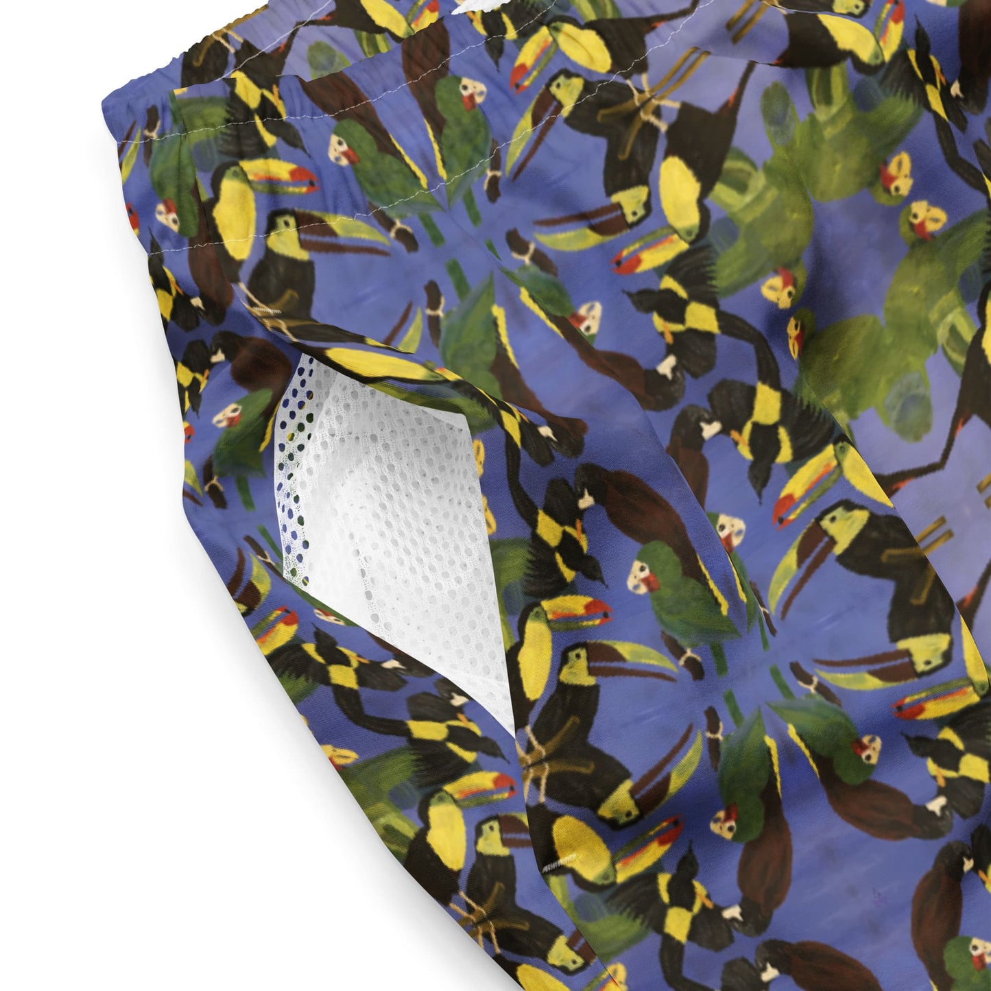 Close-up of mesh side pocket of men swim trunks with a colorful bird painting print.
