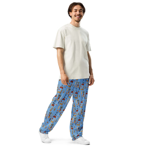 Angled view highlighting London-themed men’s joggers with side pocket and artistic travel motifs.