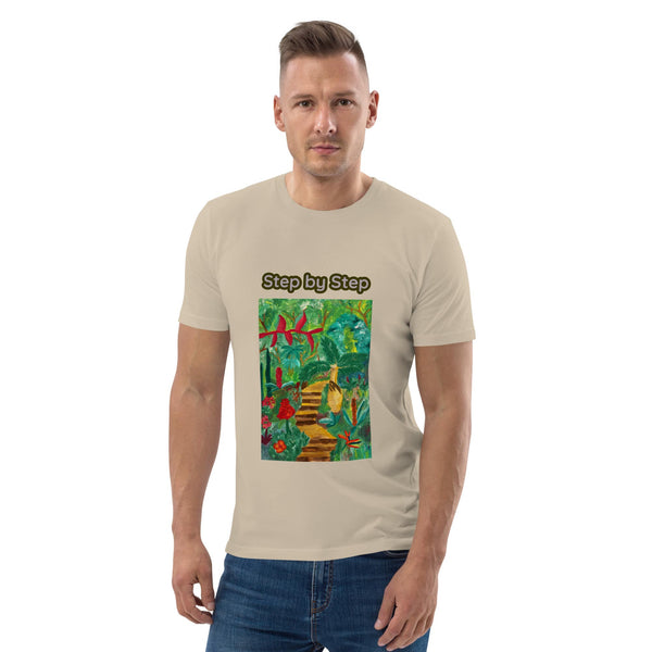 Man wearing a beige t-shirt with a colorful graphic of tropics and 'Step by Step' text on a white background