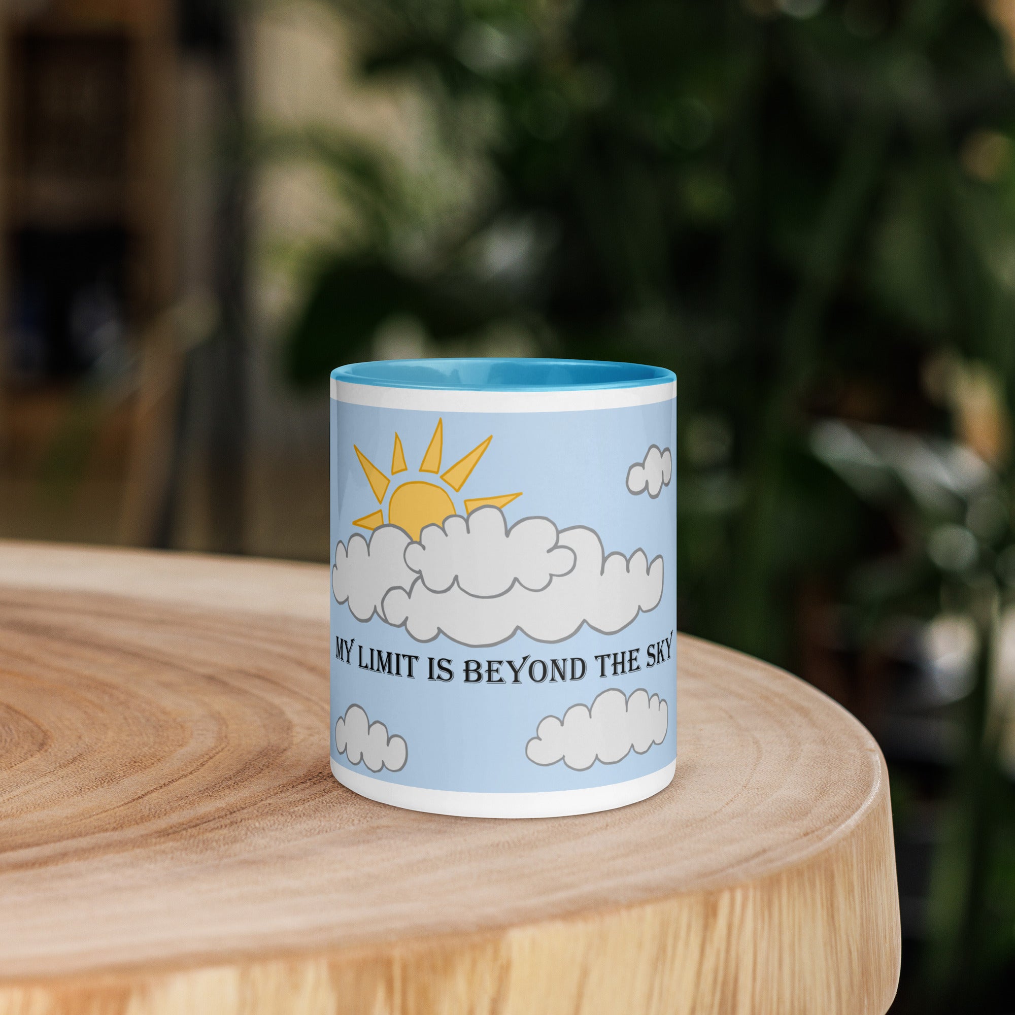 Front view of the 11 oz  "My Limit is Beyond the Sky" blue ceramic mug with a motivational design.