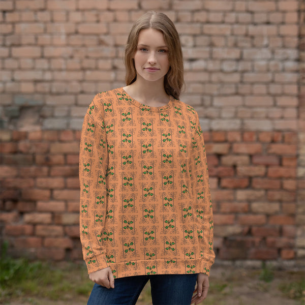 Women wearing the Oak Vine and Acorn  Sweatshirt featuring an orange background with cascading green oak leaves and acorn motifs, crafted from sustainable materials with a soft cotton-feel exterior, designed by Anke Wonder.