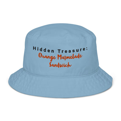 Blue embroidered bucket hat with the phrase "Hidden Treasure: Orange Marmalade Sandwich" stitched in black and orange on the front.