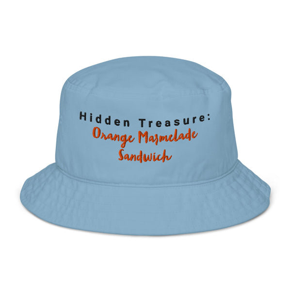 Blue embroidered bucket hat with the phrase "Hidden Treasure: Orange Marmalade Sandwich" stitched in black and orange on the front.