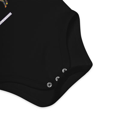 Black baby onesie with button details on a white background