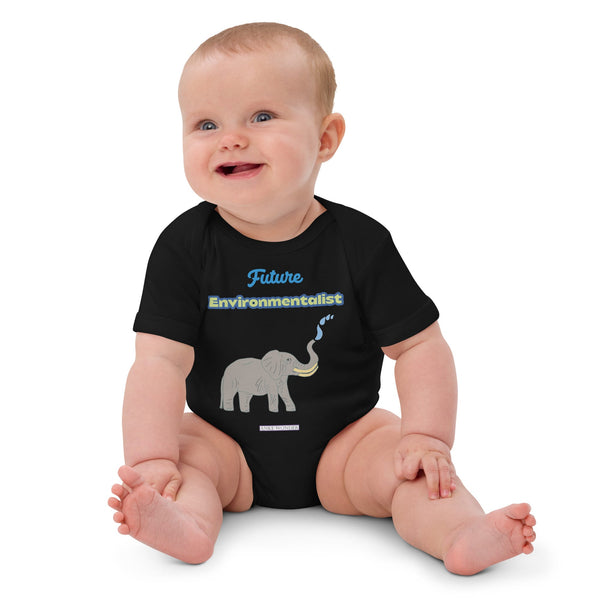 Black organic baby bodysuit with “Future Environmentalist” text and elephant graphic worn by a baby girl by Anke Wonder.