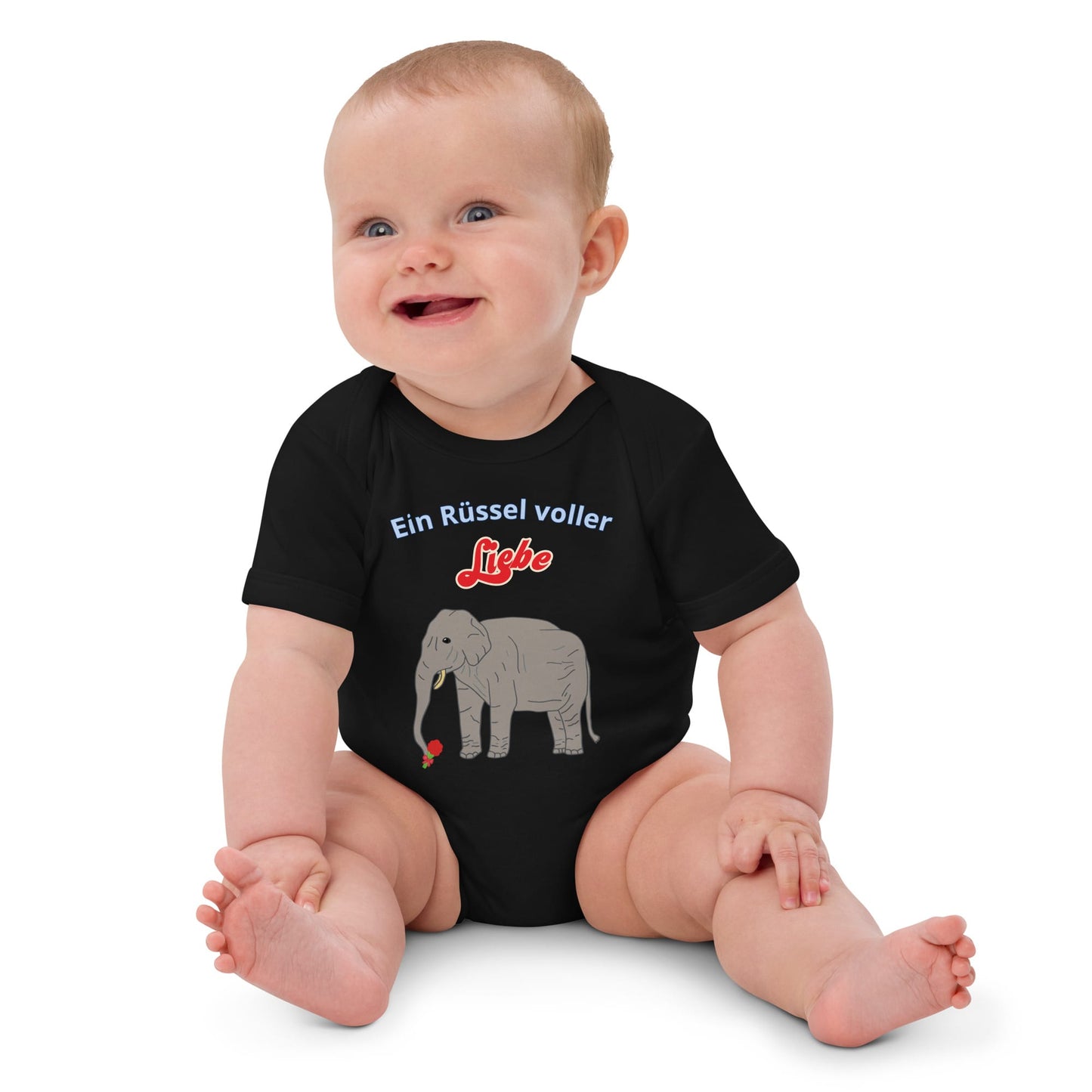 Black baby bodysuit with elephant design and flower in trunk worn by Baby girl.