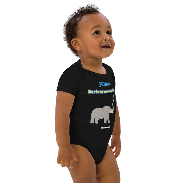 Black organic cotton bodysuit with elephant and “Future Environmentalist” lettering worn by a little boy, standing to the right.