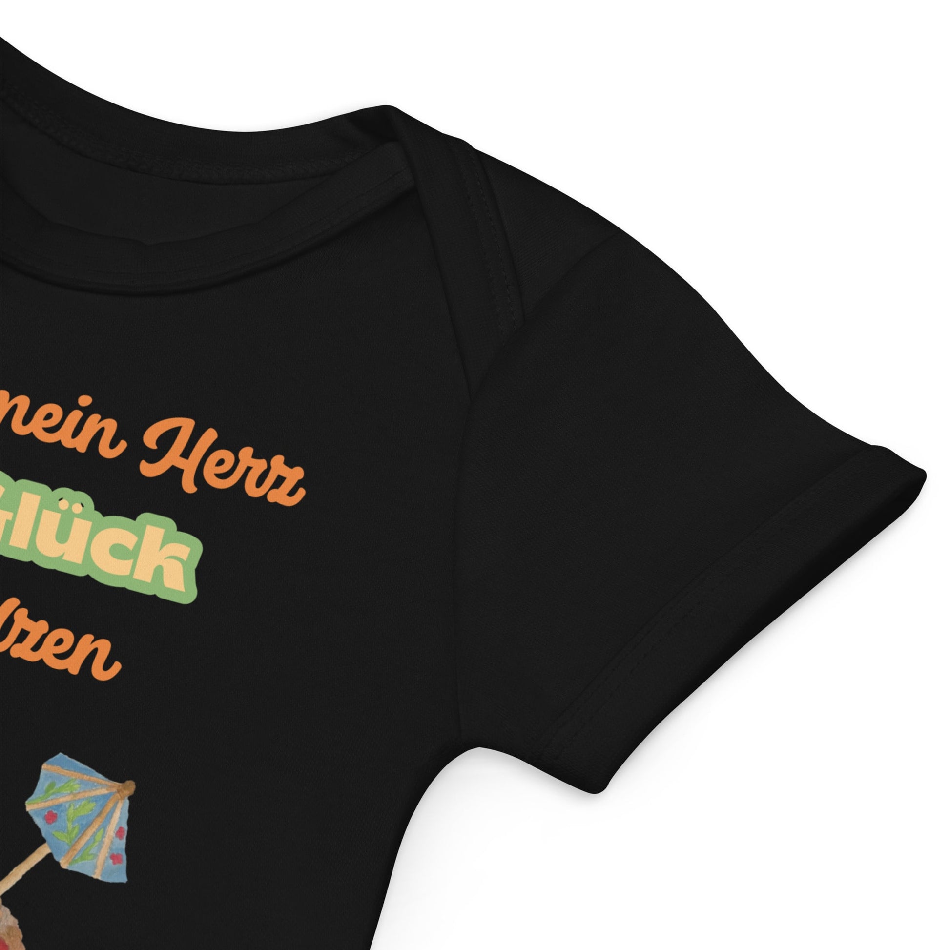 Soft envelope neckline for gentle on/off of black baby bodysuit with German phrase and melting heart cone.