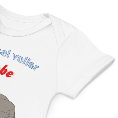 Quality stitching on the sleeves of the white organic cotton baby bodysuit with elephant design.