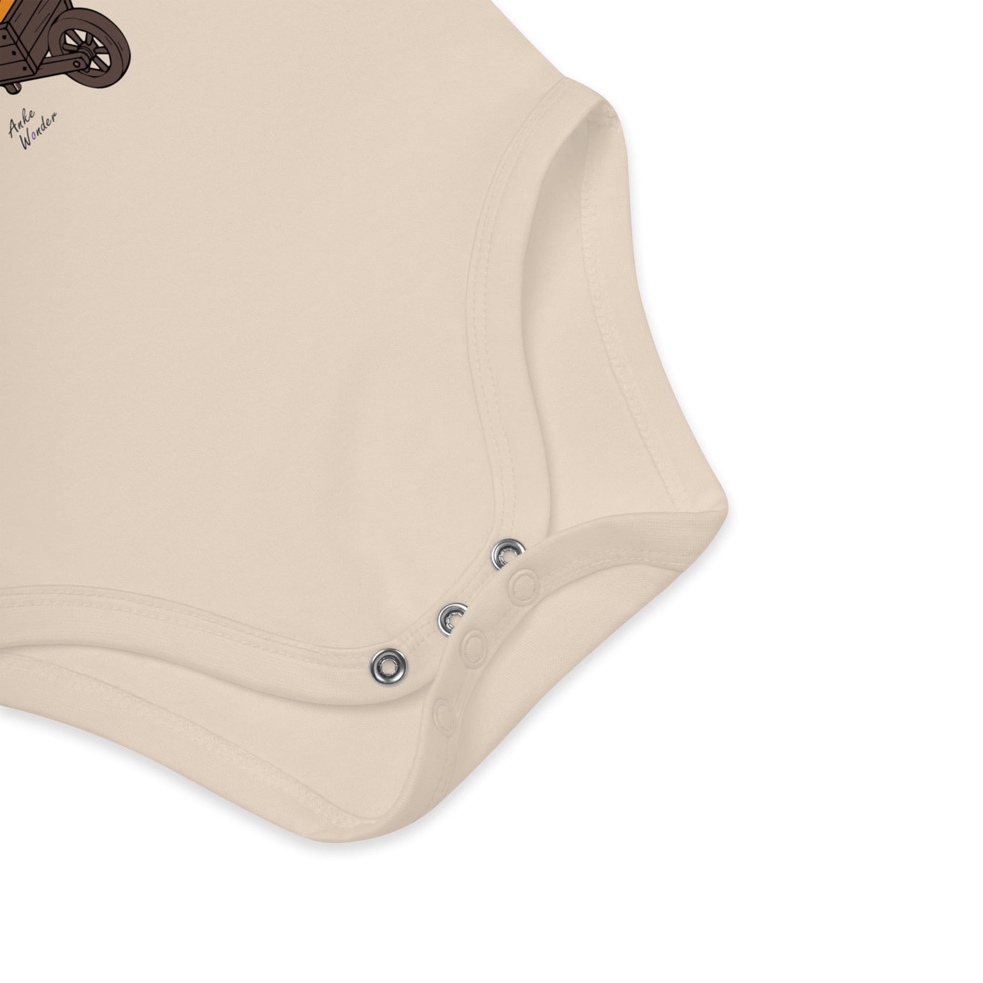 Beige baby onesie with button details on a white background