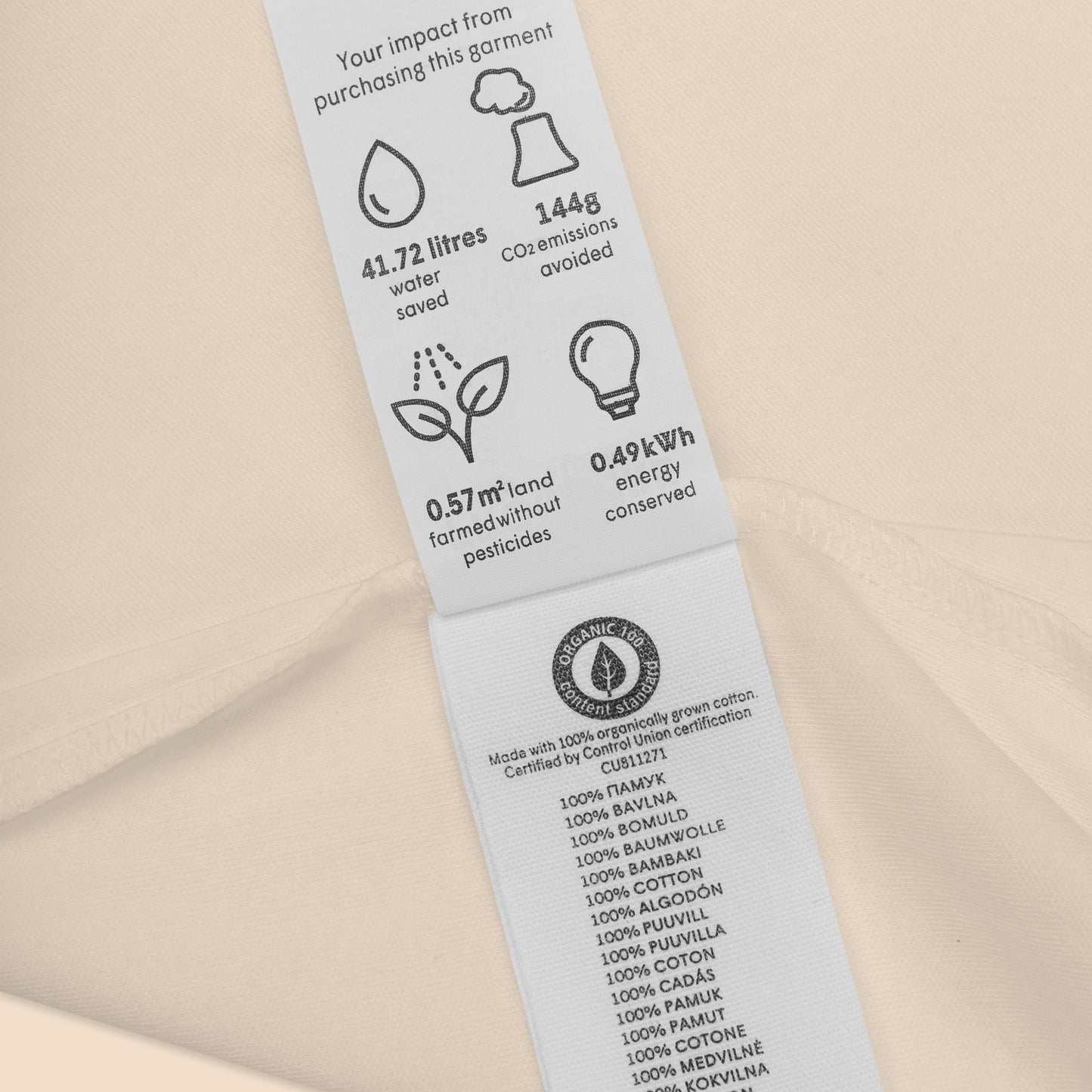 Certified organic cotton label on a baby bodysuit, highlighting the benefits of the eco-friendly fabric.