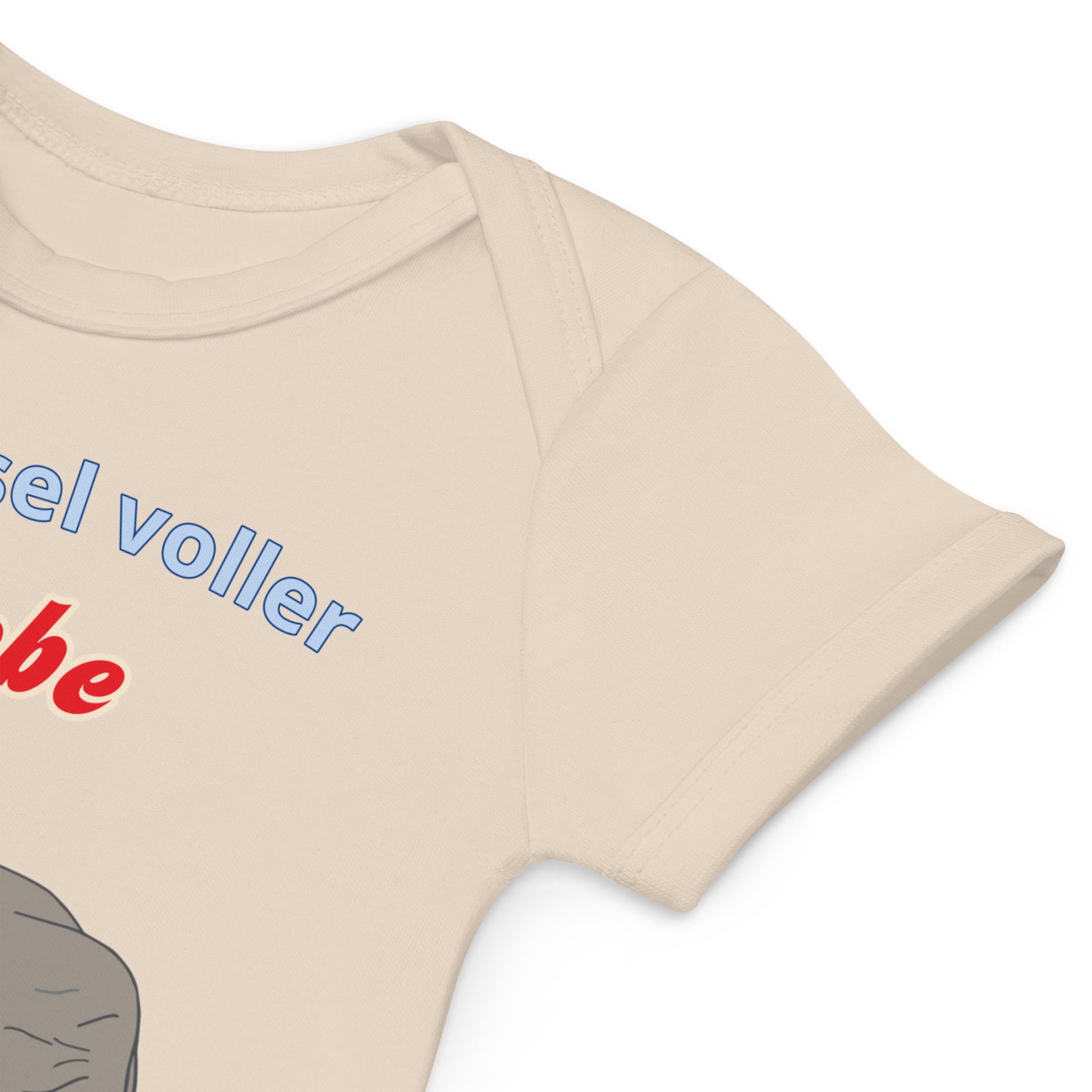 Quality stitching on the sleeves of the natural color organic cotton baby bodysuit with elephant design.