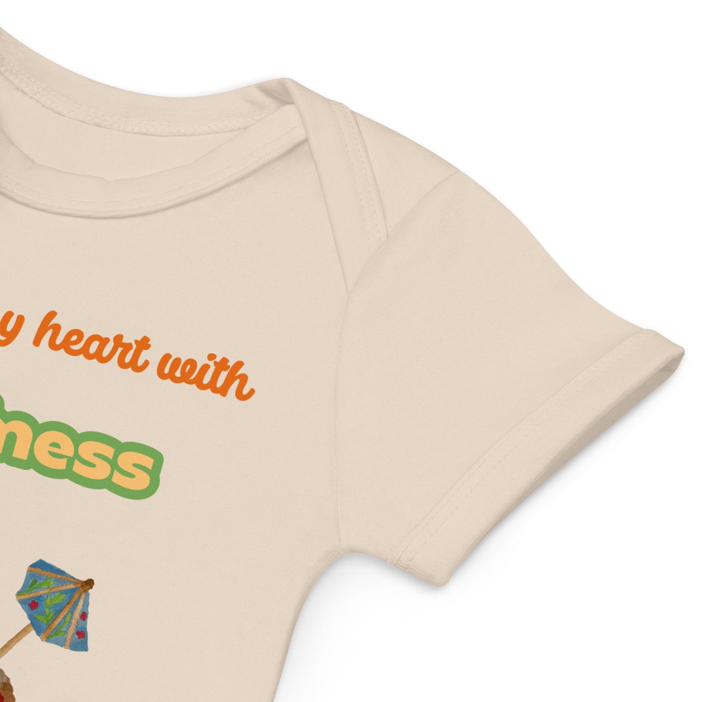Envelope neck for easy dressing of natural-colored baby bodysuit with “You melt my heart with Happiness” and heart cone print.