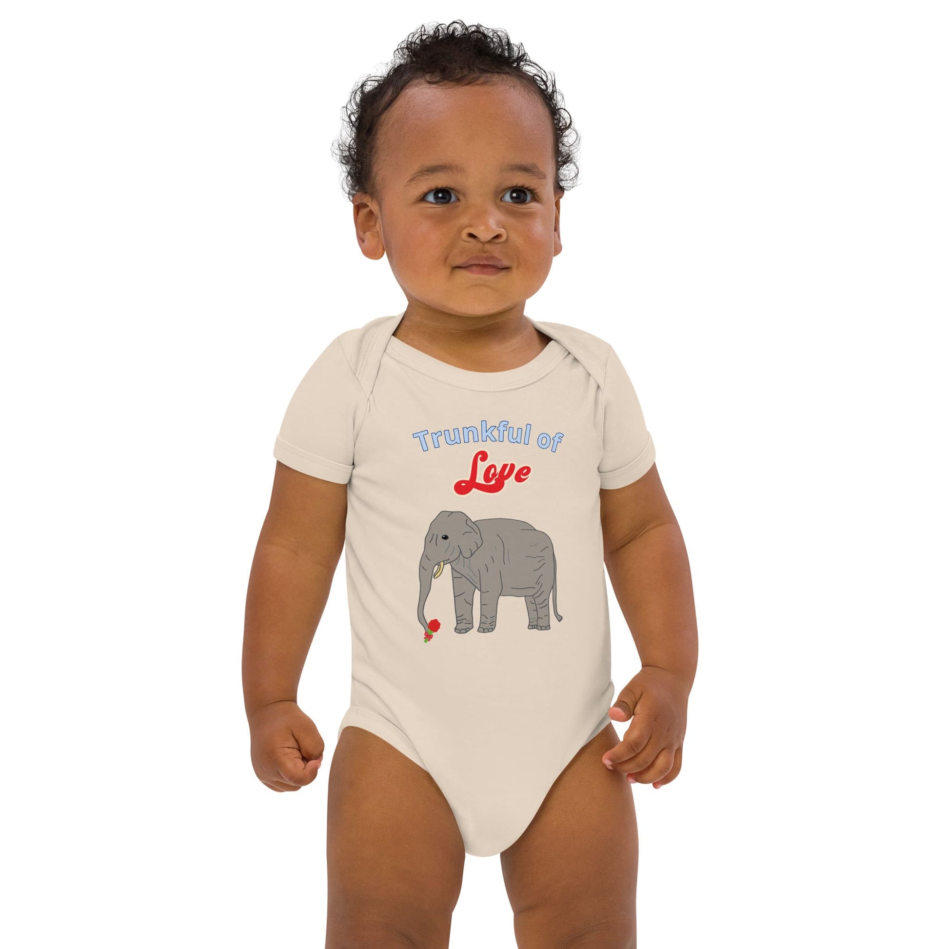 Baby boy in a natural cotton bodysuit with an elephant holding a flower and the words 'Trunkful of Love'.