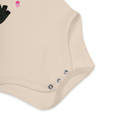 Detail of bottom snap closures made from nickel-free metal of natural colored baby bodysuit bunny with rose and decorative pink dots around the “My First Rose for You” print.