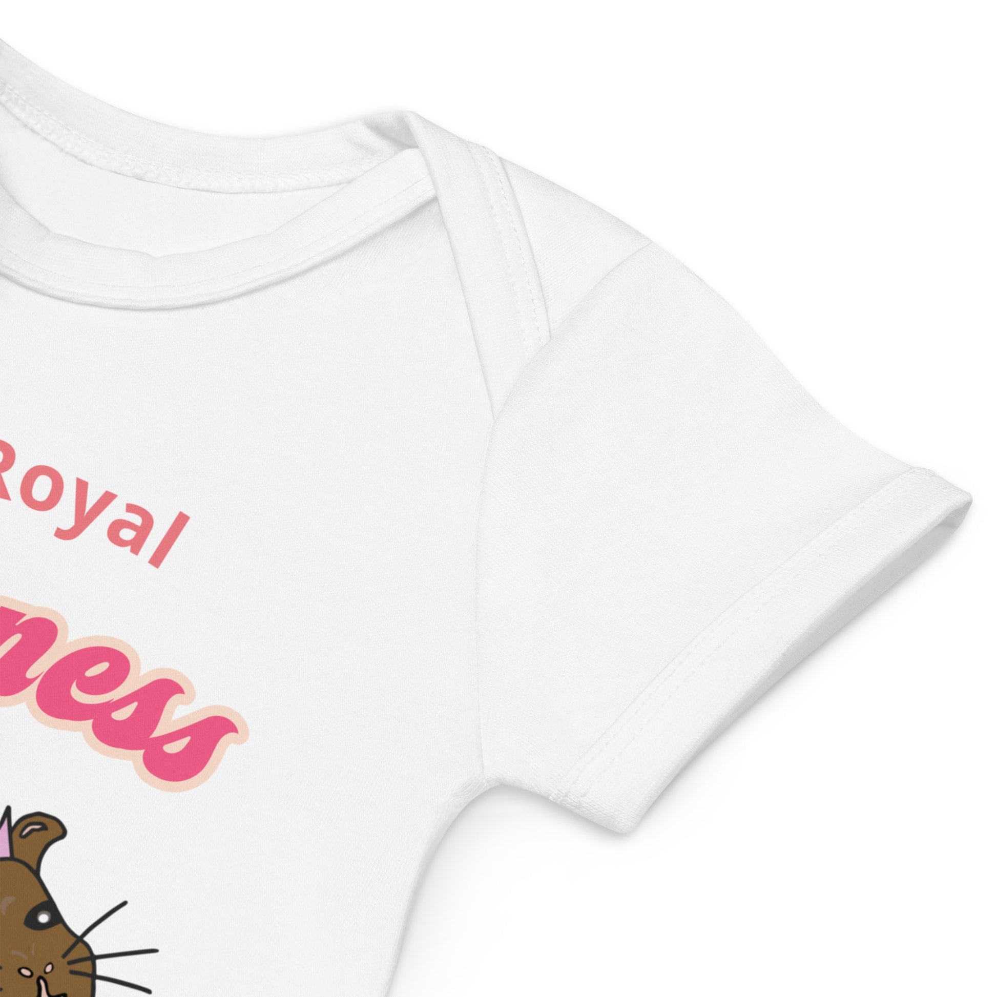 Close-up of envelope sleeve of white baby bodysuit with a cute guinea pig wearing a crown and the phrase "Her Royal Cuteness.