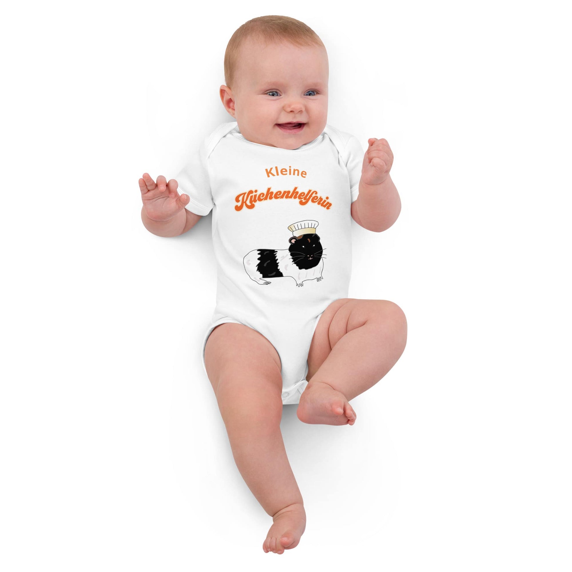 Baby Girl wearing a soft, breathable organic cotton baby bodysuit in white, featuring a chef-themed guinea pig illustration.