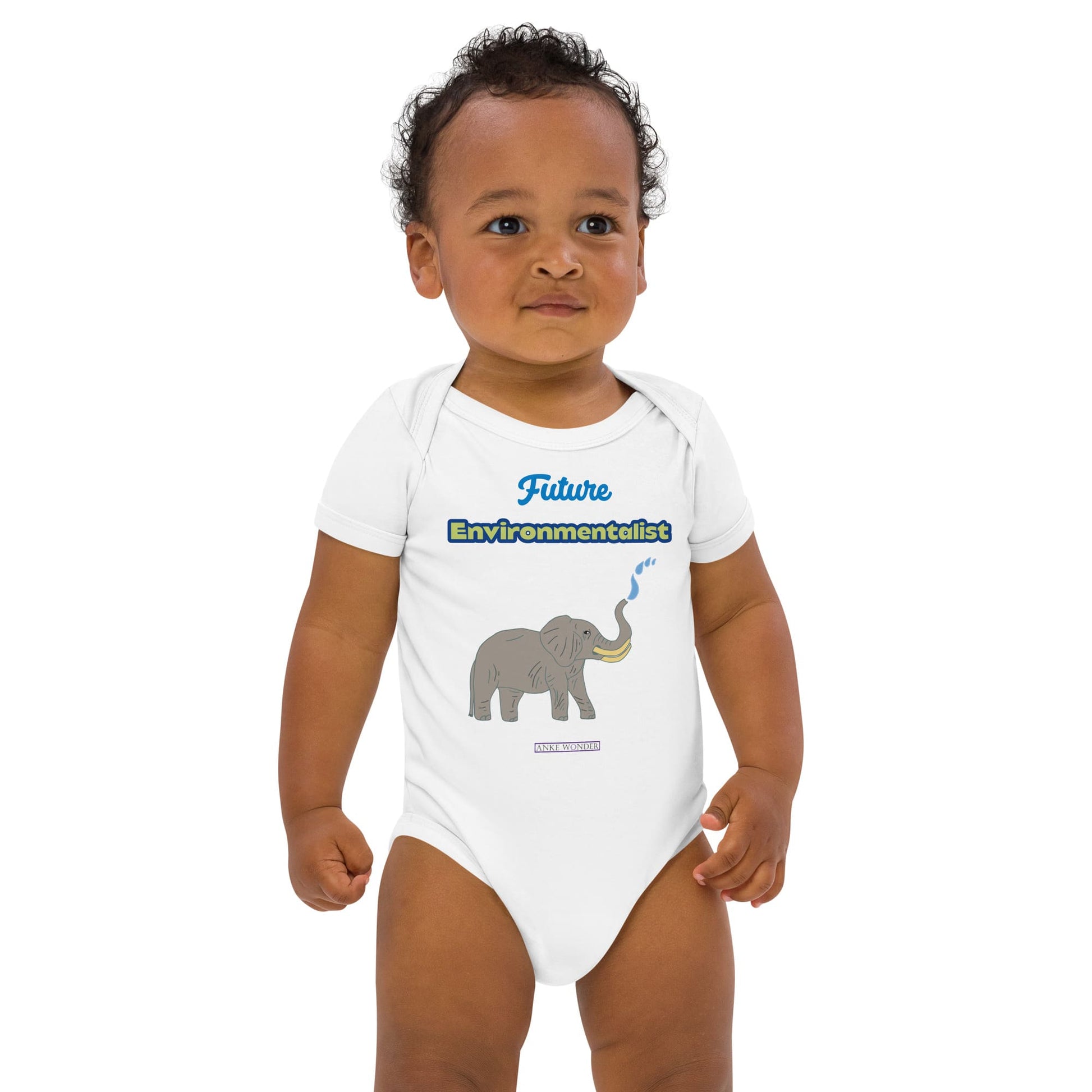 Baby boy wearing white organic bodysuit with eco slogan 'Future Environmentalist' and elephant illustration.