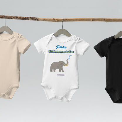 White bodysuits displayed on a  hanger with elephant graphic and the words 'Future Environmentalist' by Anke Wonder.