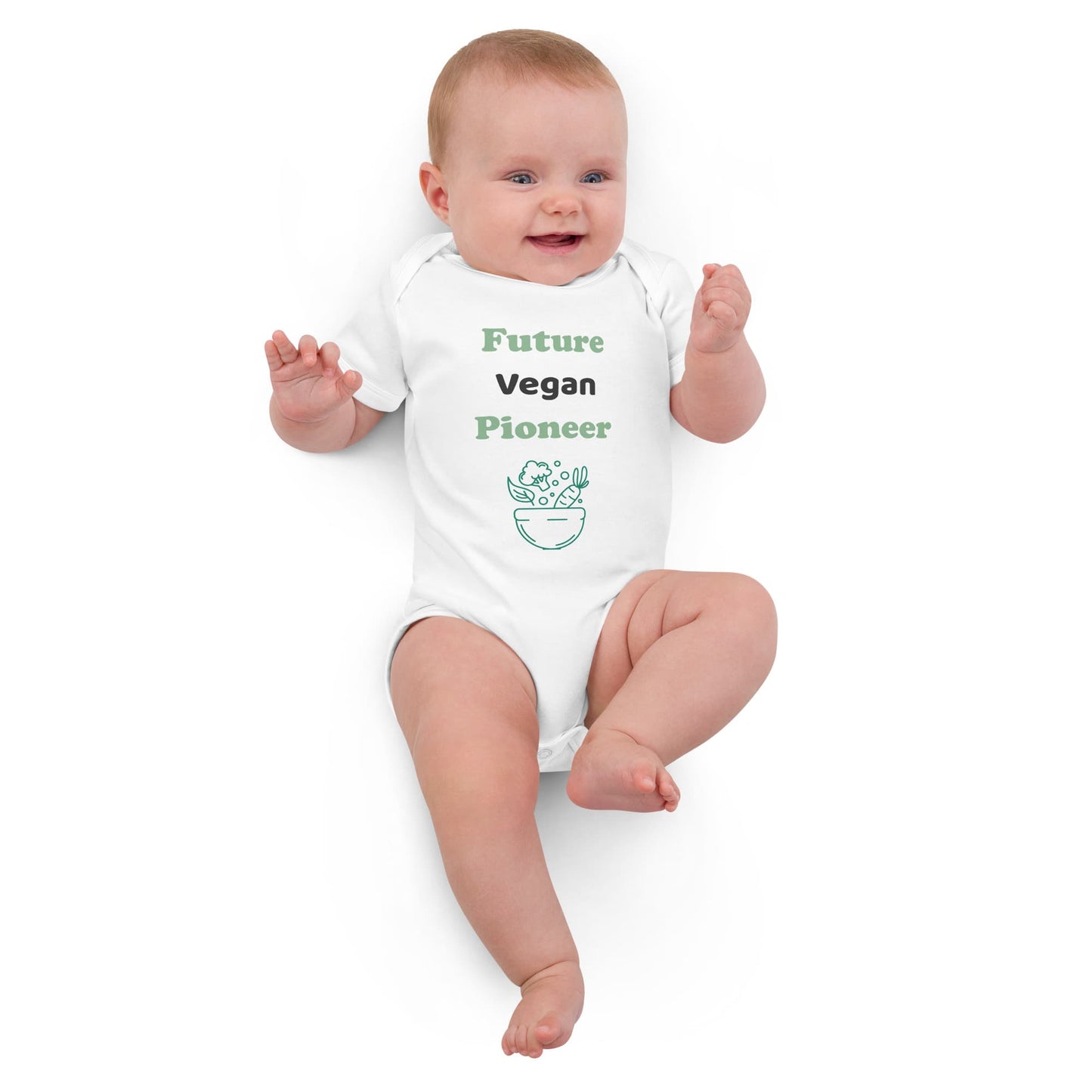 A baby girl laying down, dressed in a white organic cotton bodysuit featuring the “Future Vegan Pioneer” design, relaxed and cozy.