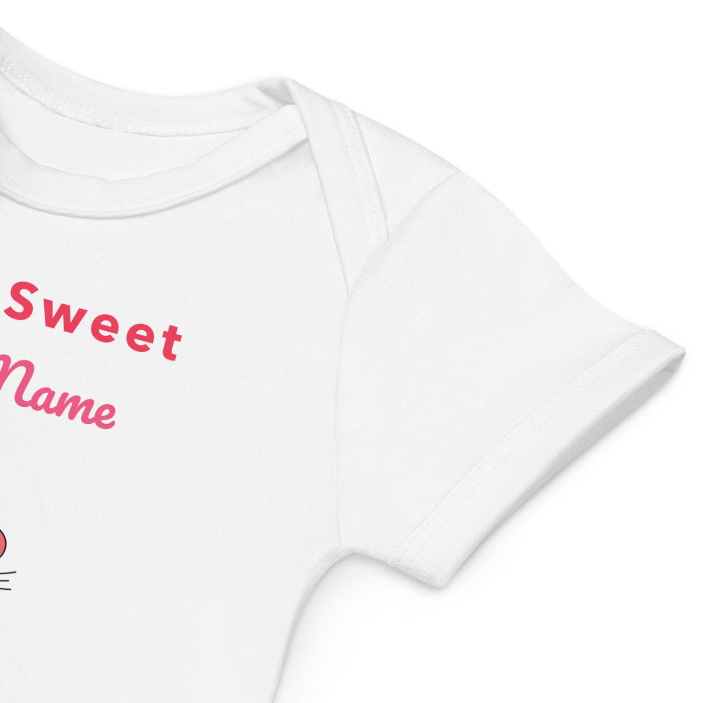 Sleeve of white baby onesie with 'Sweet Name' text in red on a white background
