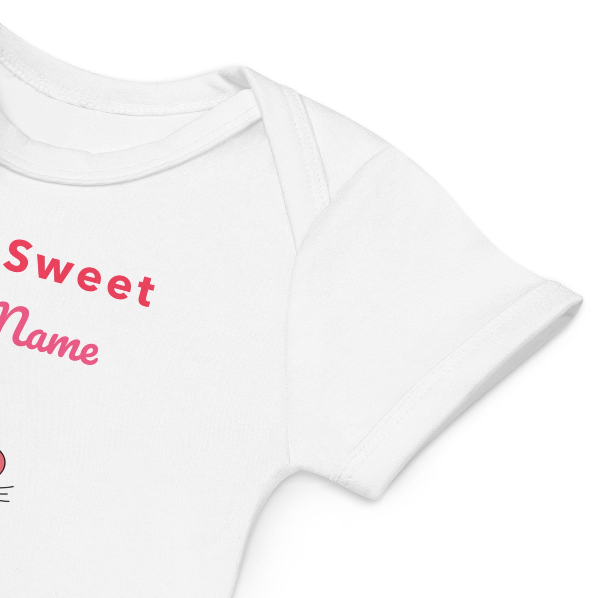 Sleeve of white baby onesie with 'Sweet Name' text in red on a white background