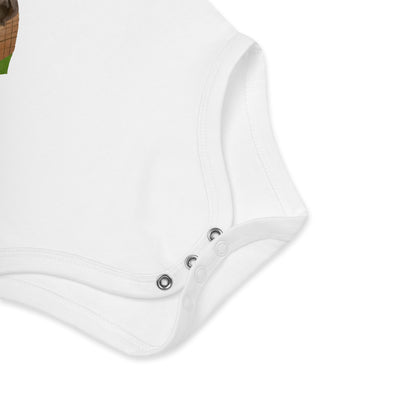 Three nickel-free snaps at the bottom of white organic bodysuit featuring multicolor heart-shaped ice cream and German text.