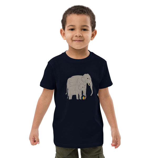 Front view of boy wearing a black t-shirt with elephant and baby design by Anke Wonder.