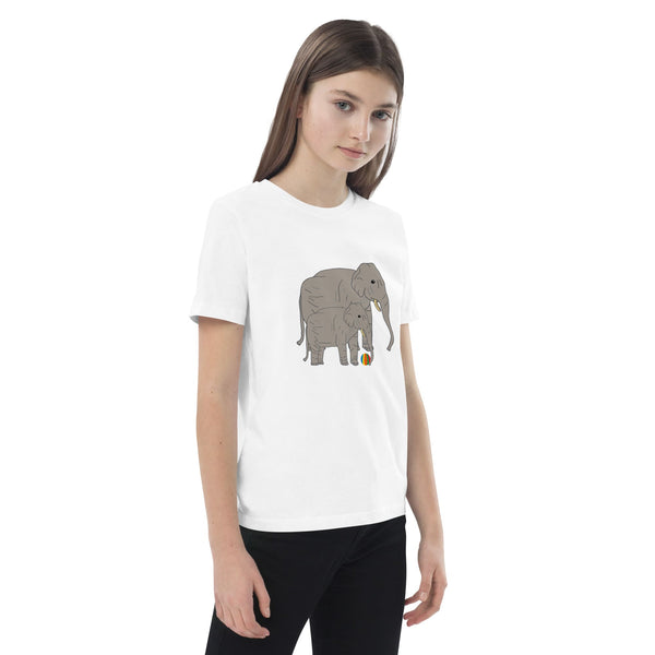 Side view of girl wearing a white t-shirt with elephant and baby design by Anke Wonder.