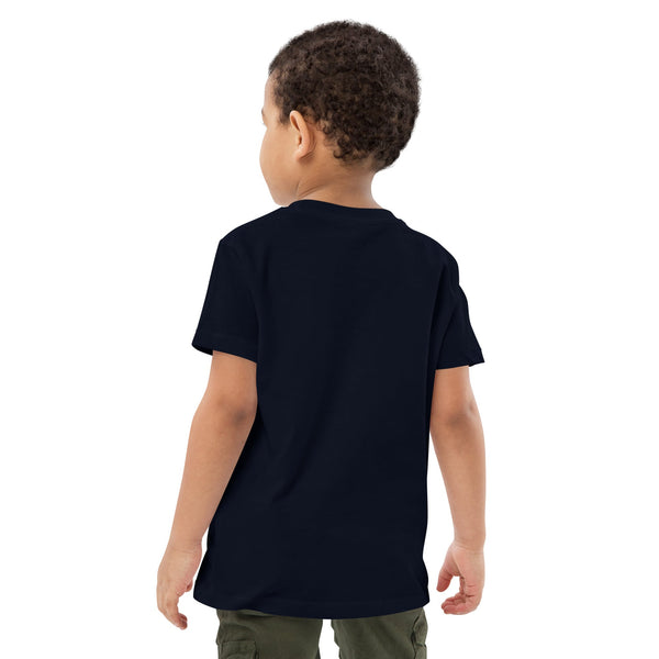 Back View of boy wearing a black t-shirt on a white background