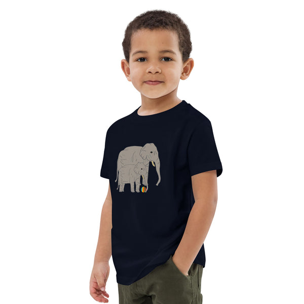 Side view of boy wearing a black t-shirt with elephant and baby design by Anke Wonder.