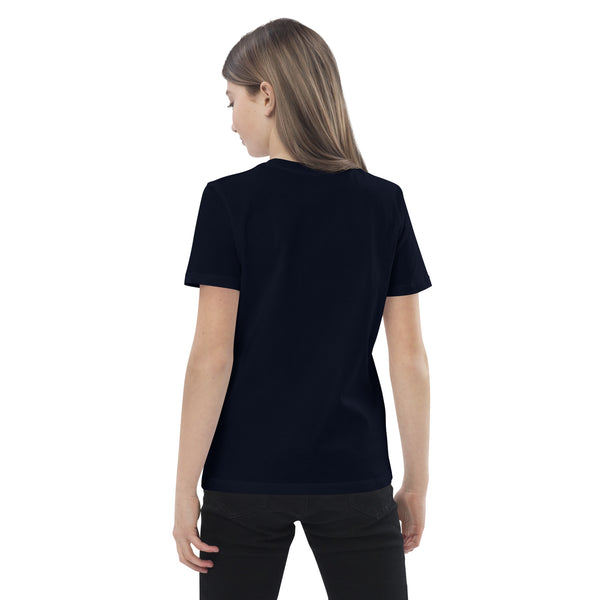 Girl showing the back of a navy organic cotton t-shirt, plain with no design.