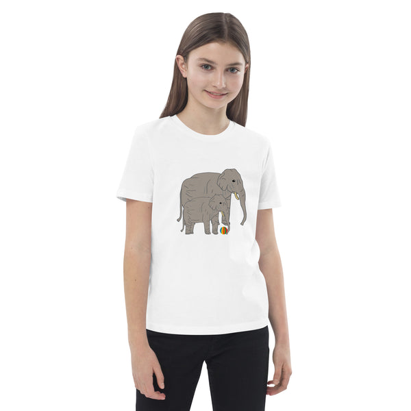 Girl wearing a white organic cotton t-shirt with a playful elephant and baby elephant design on the front.