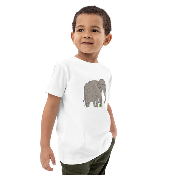 Side view of boy wearing a white t-shirt with playful elephant and baby design by Anke Wonder.