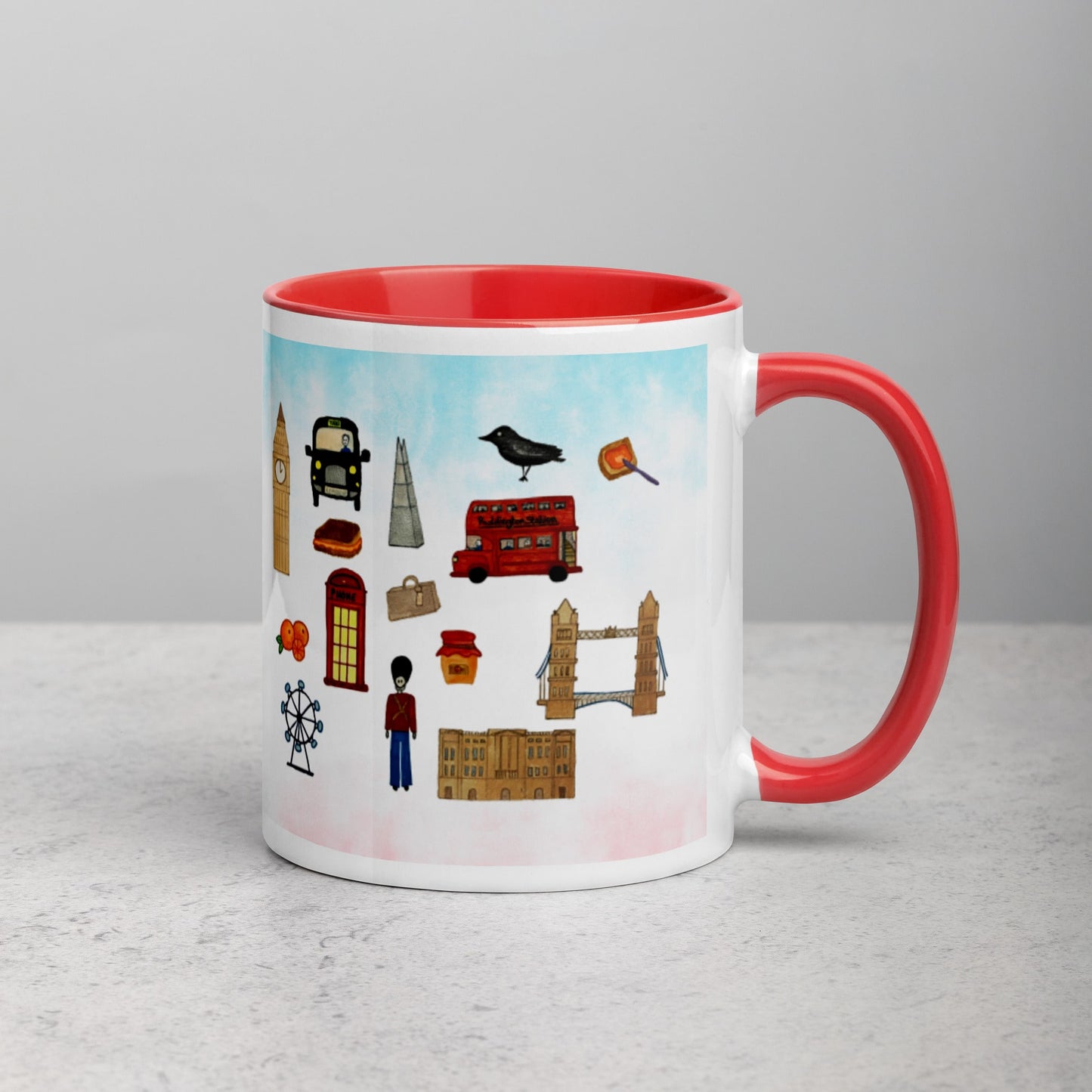 Right side view of ceramic mug displaying London icons design, including Tower Bridge and double-decker bus.