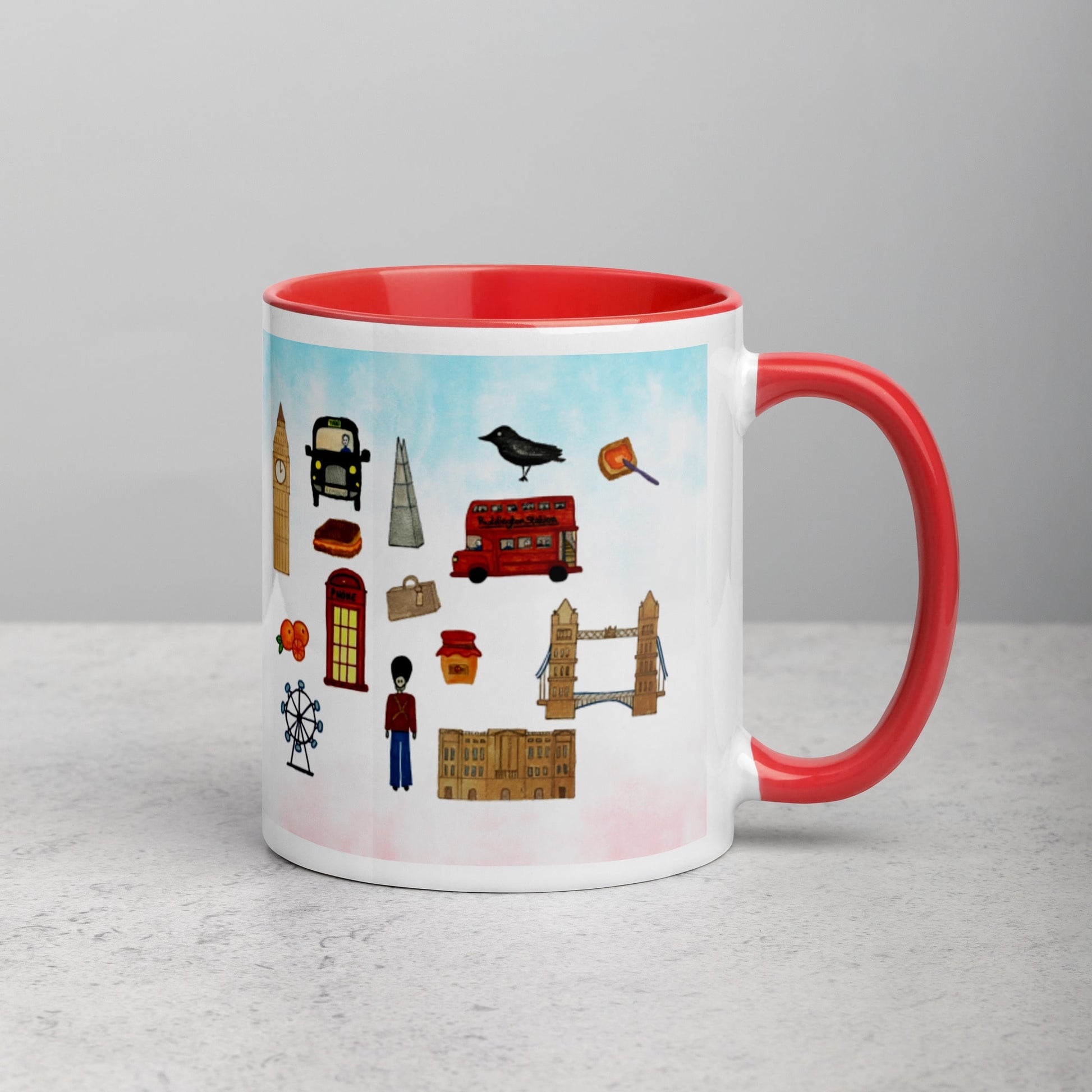 Right side view of ceramic mug displaying London icons design, including Tower Bridge and double-decker bus.